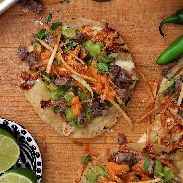 California Taco with grilled tri-tip, quesillo, guacamole, salsa, and crispy…